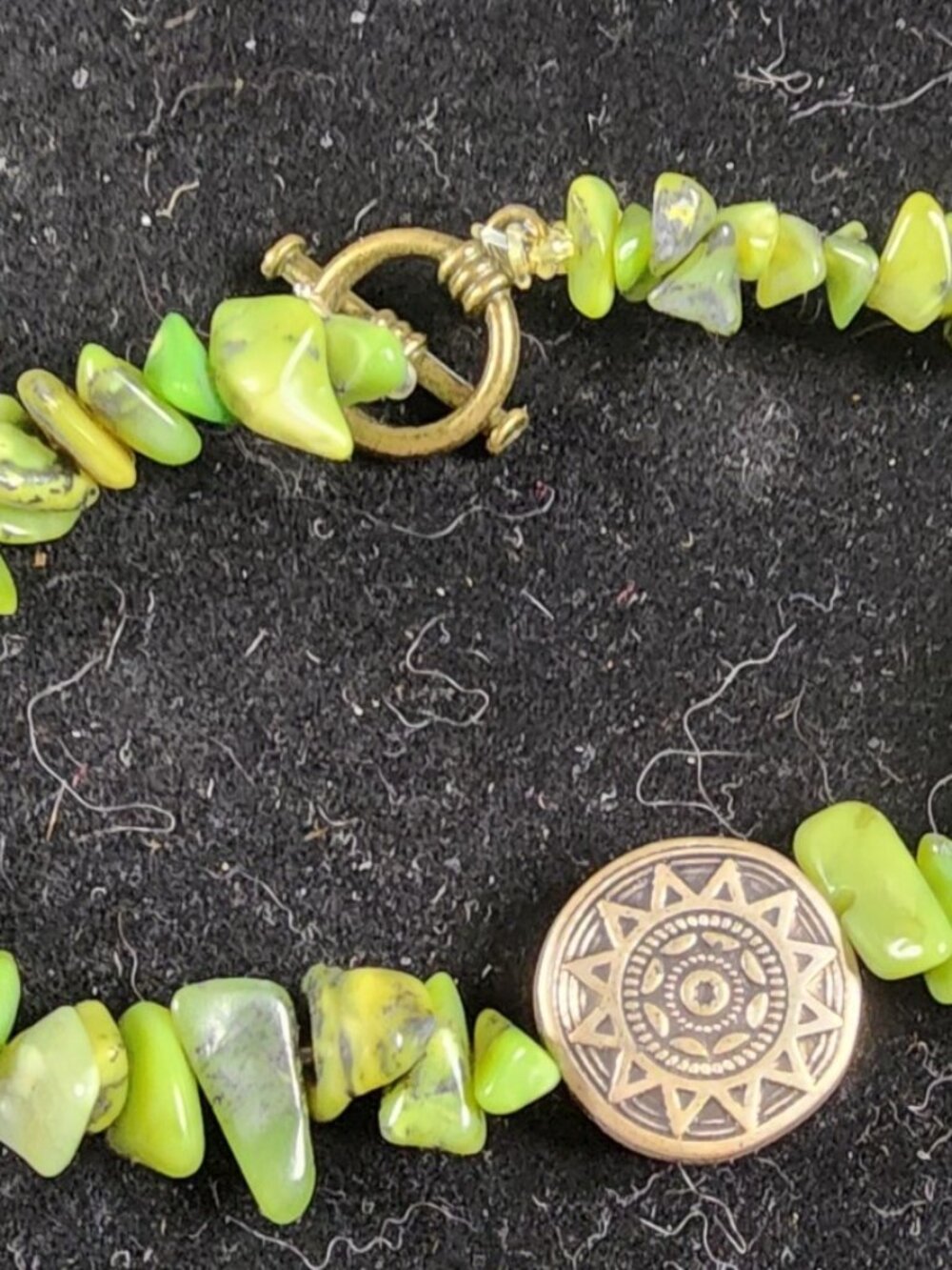 Hand Crafted Green Stone Bracelet with Bronze-Colored Sun
